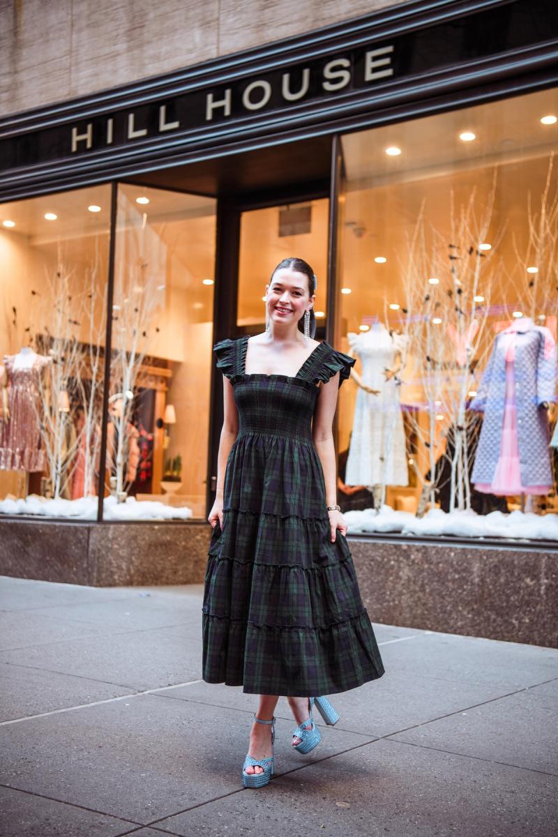 Hill House Home Store front at Rockefeller Center with Nell Diamond in a nap dress