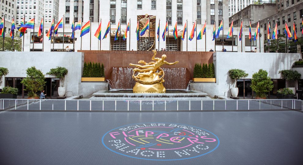 Pride flags on display around Flipper's Roller Boogie Palace at The Rink