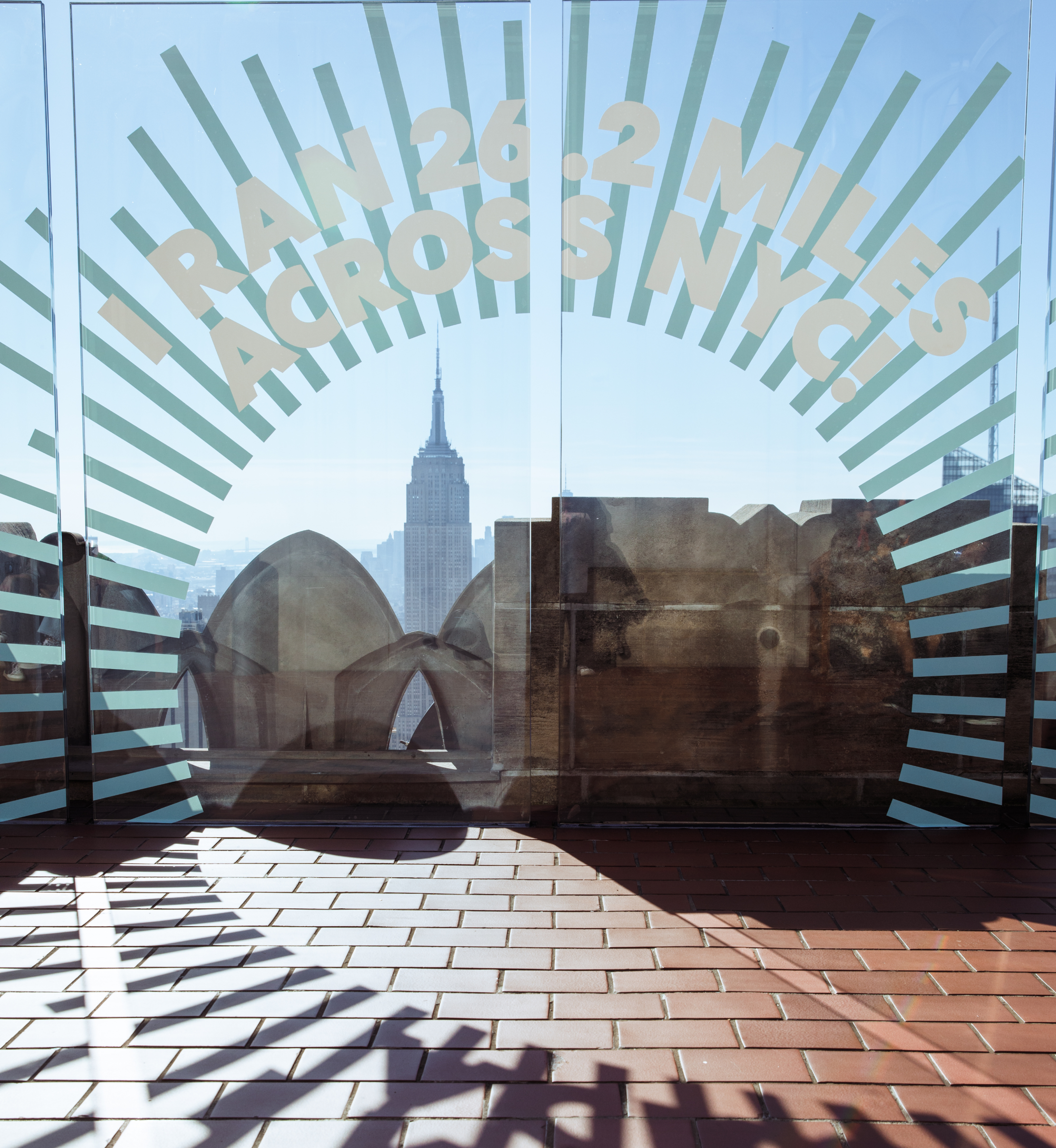A NYC Marathon decal at Top of the Rock