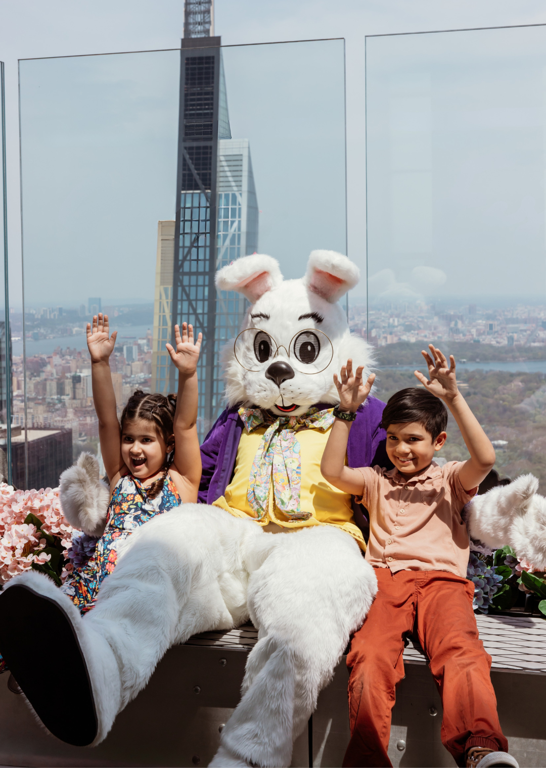 easter bunny with two kids at top of the rock