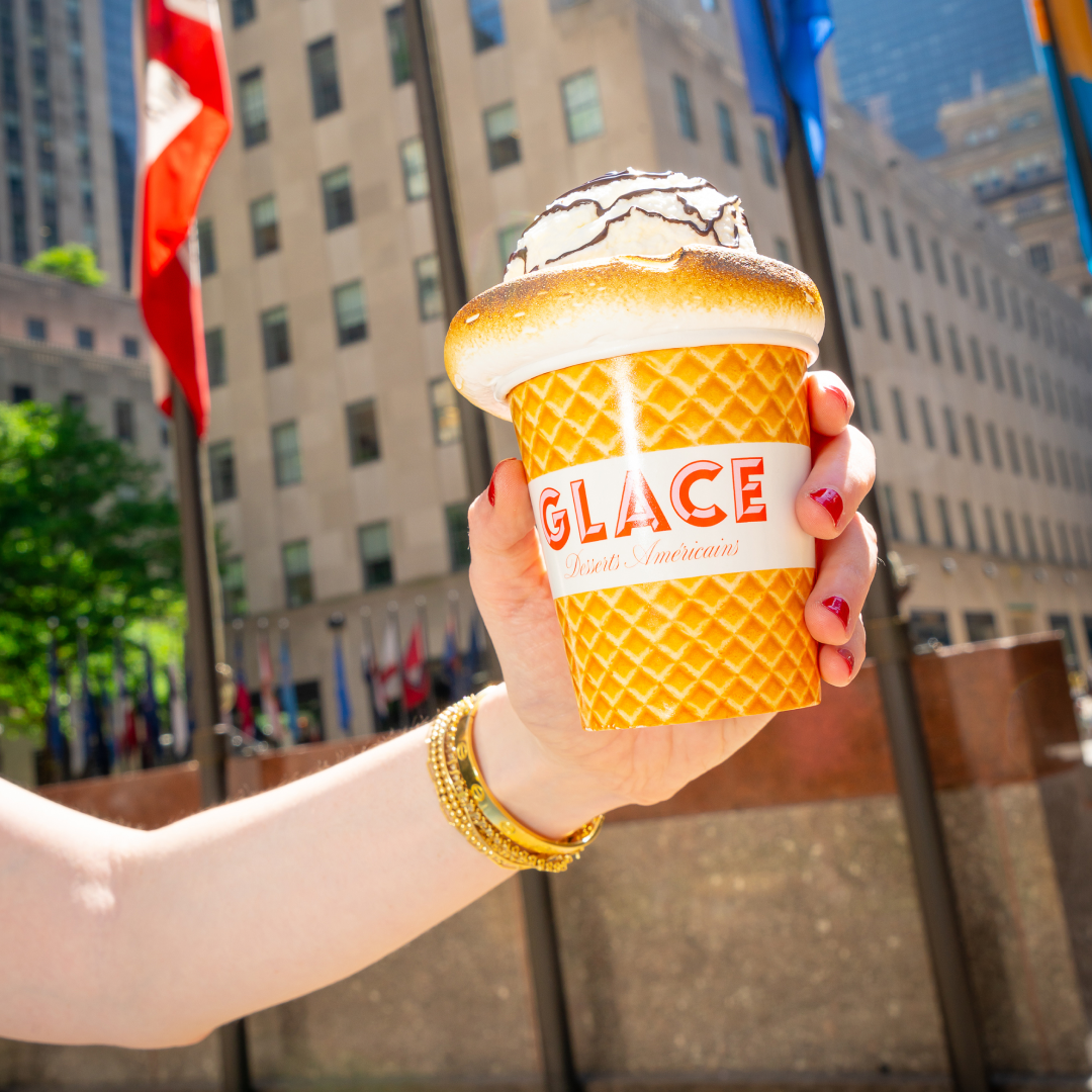Hand holding a frozen treat from the Glace truck at Rockefeller Center