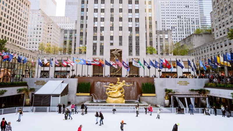 the rink at rockefeller center with skaters