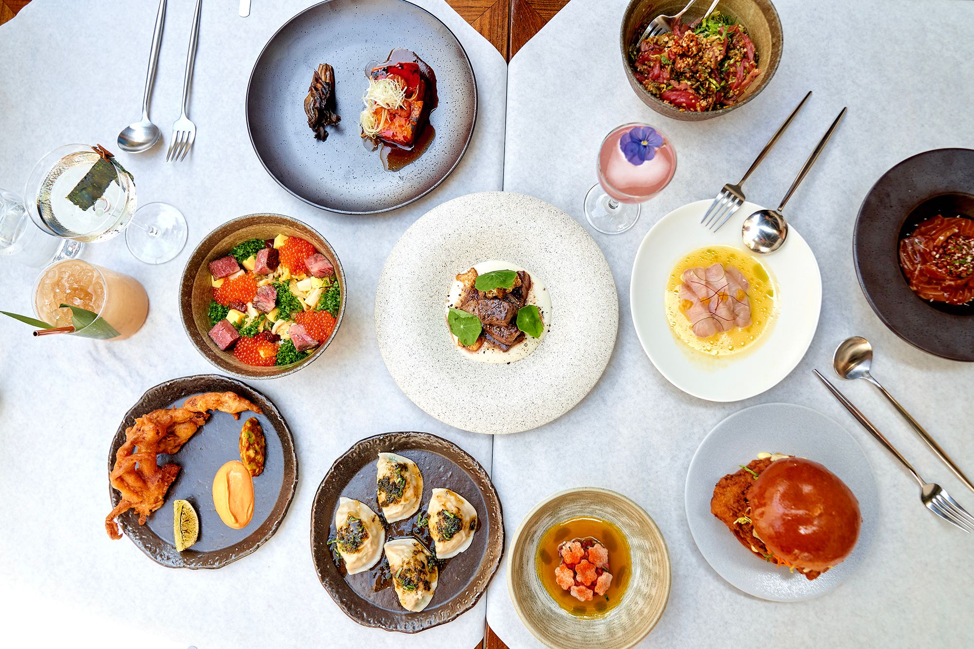 View of a table with several dishes from above