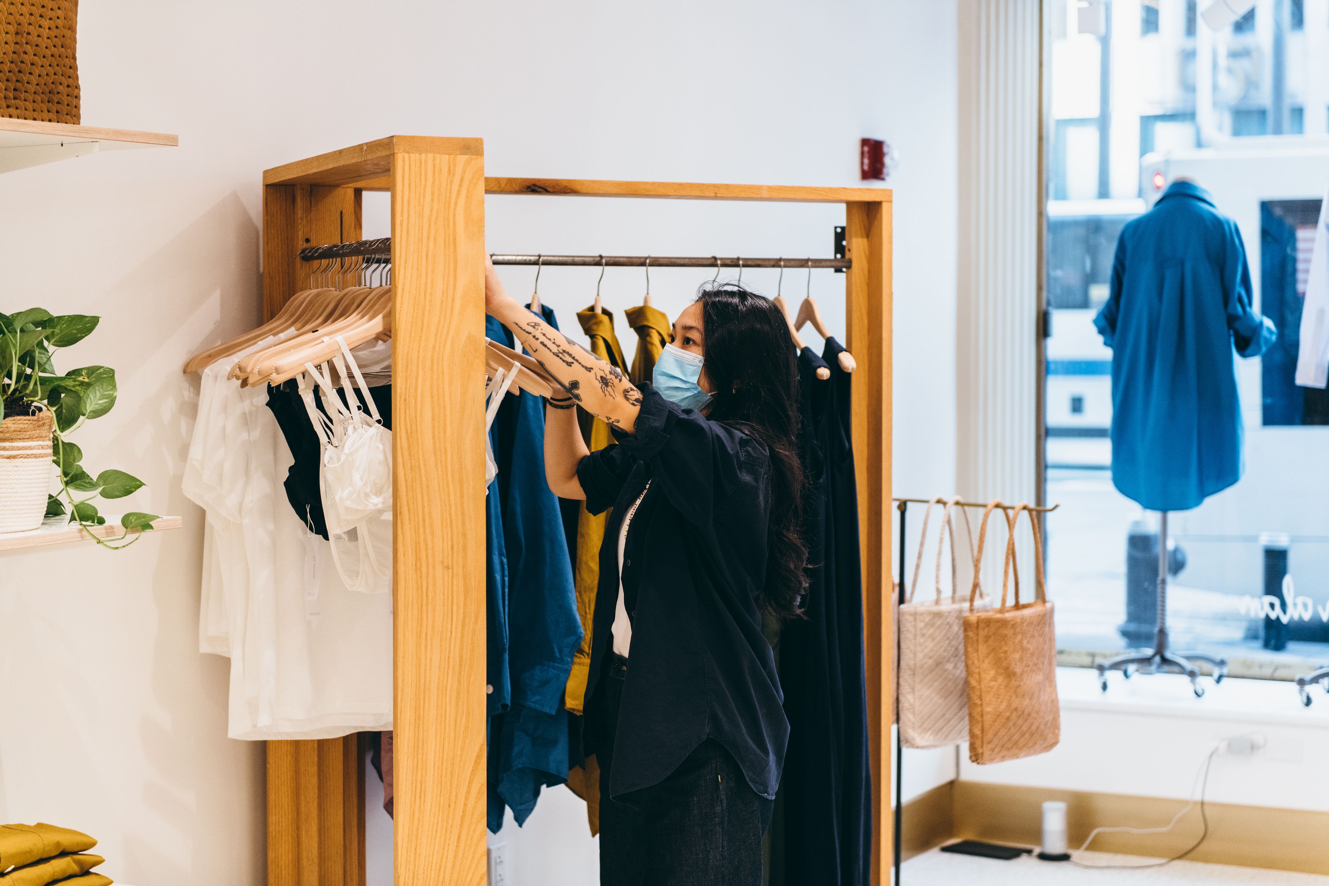 Woman shopping for clothes at a store in Rockefeller Center.