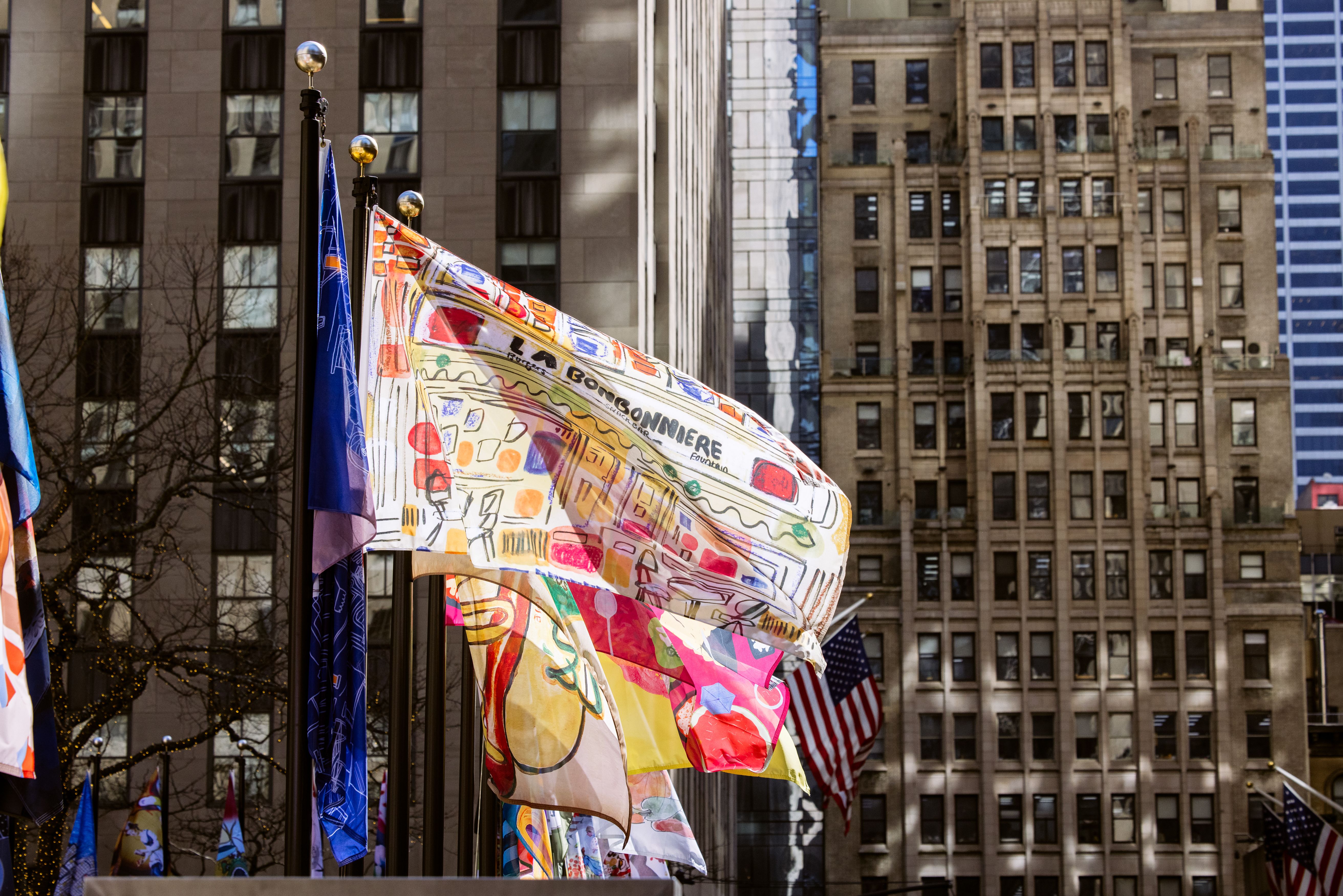 The Flag Project 2023 flags flying over The Rink at Rockefeller Center