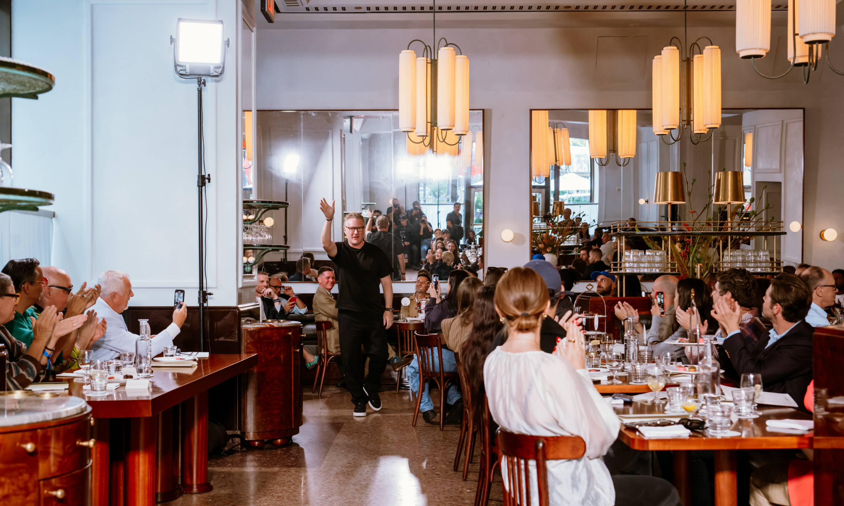 Designer Todd Snyder greeting attendees after his 2024 NYFW show at Rockefeller Center