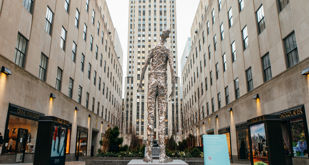Tom Friedman’s “Looking Up” sculpture peers at 30 Rockefeller Plaza.