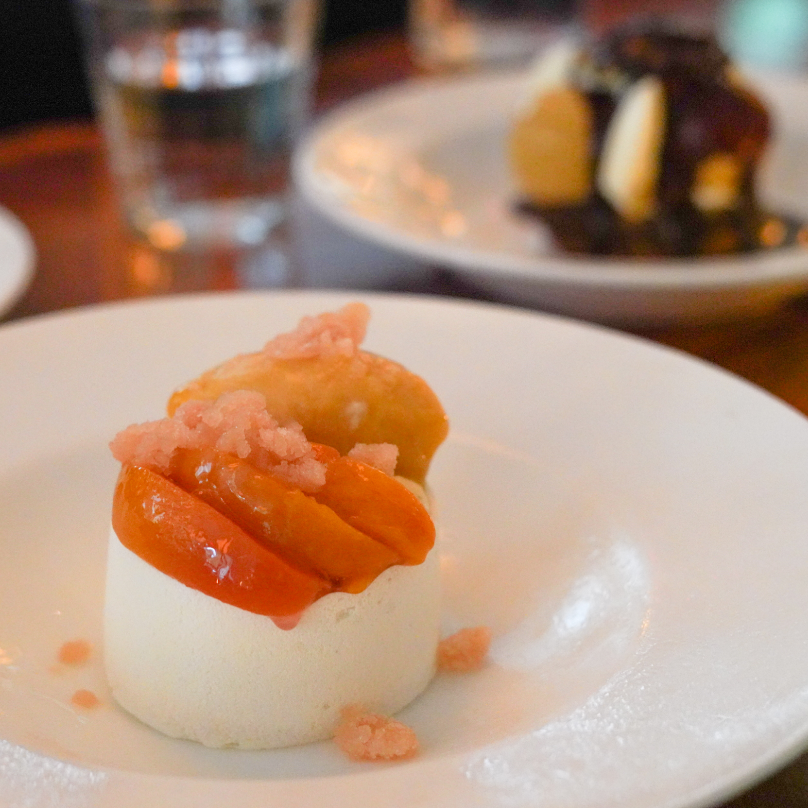Peach vacherin on a plate from Le Rock at Rockefeller Center
