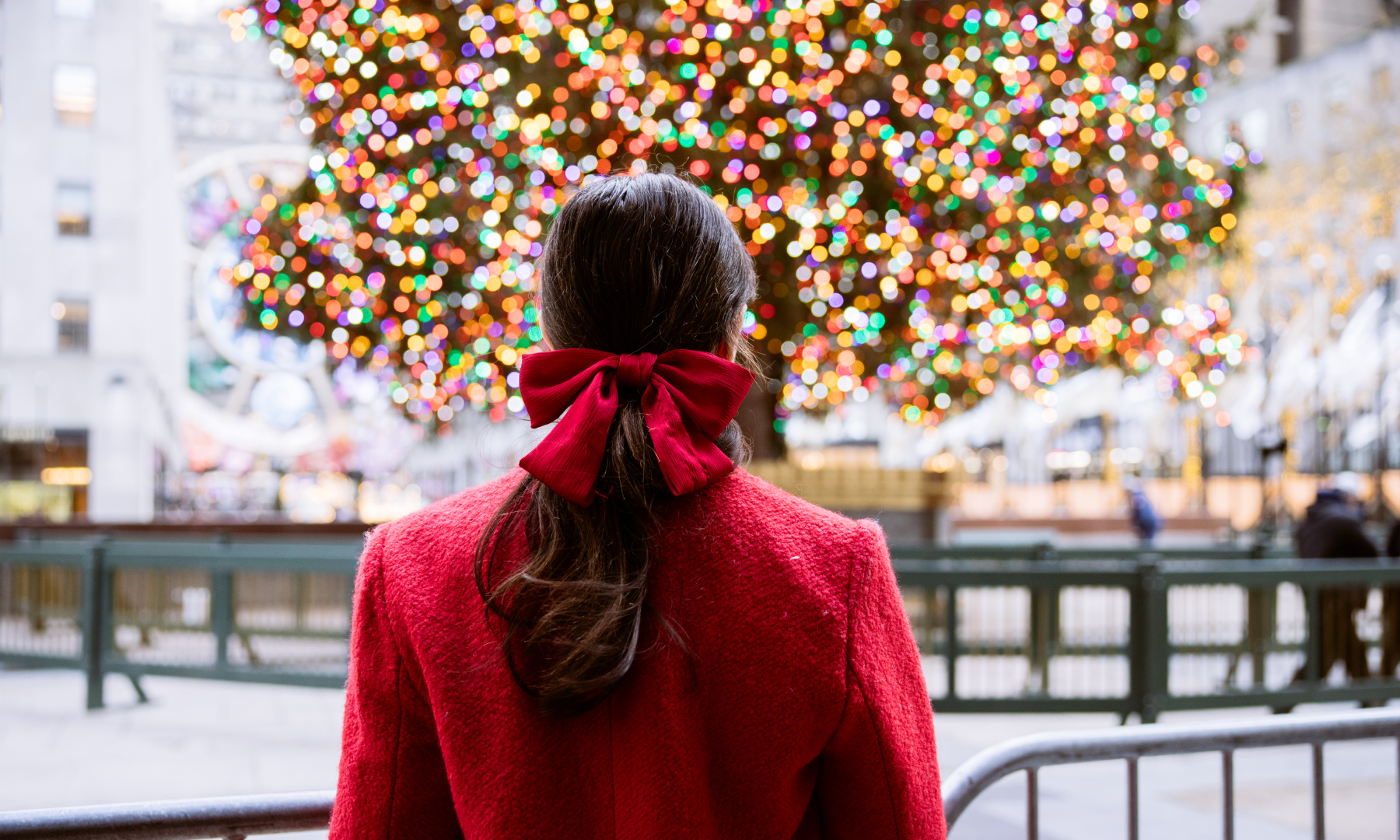 Woman looking at the Rockefeller Center Christmas Tree