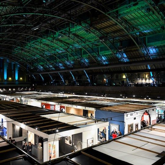 Visitors walking around at The Winter Show