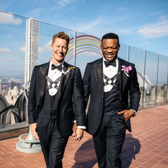 Two grooms at Top of the Rock