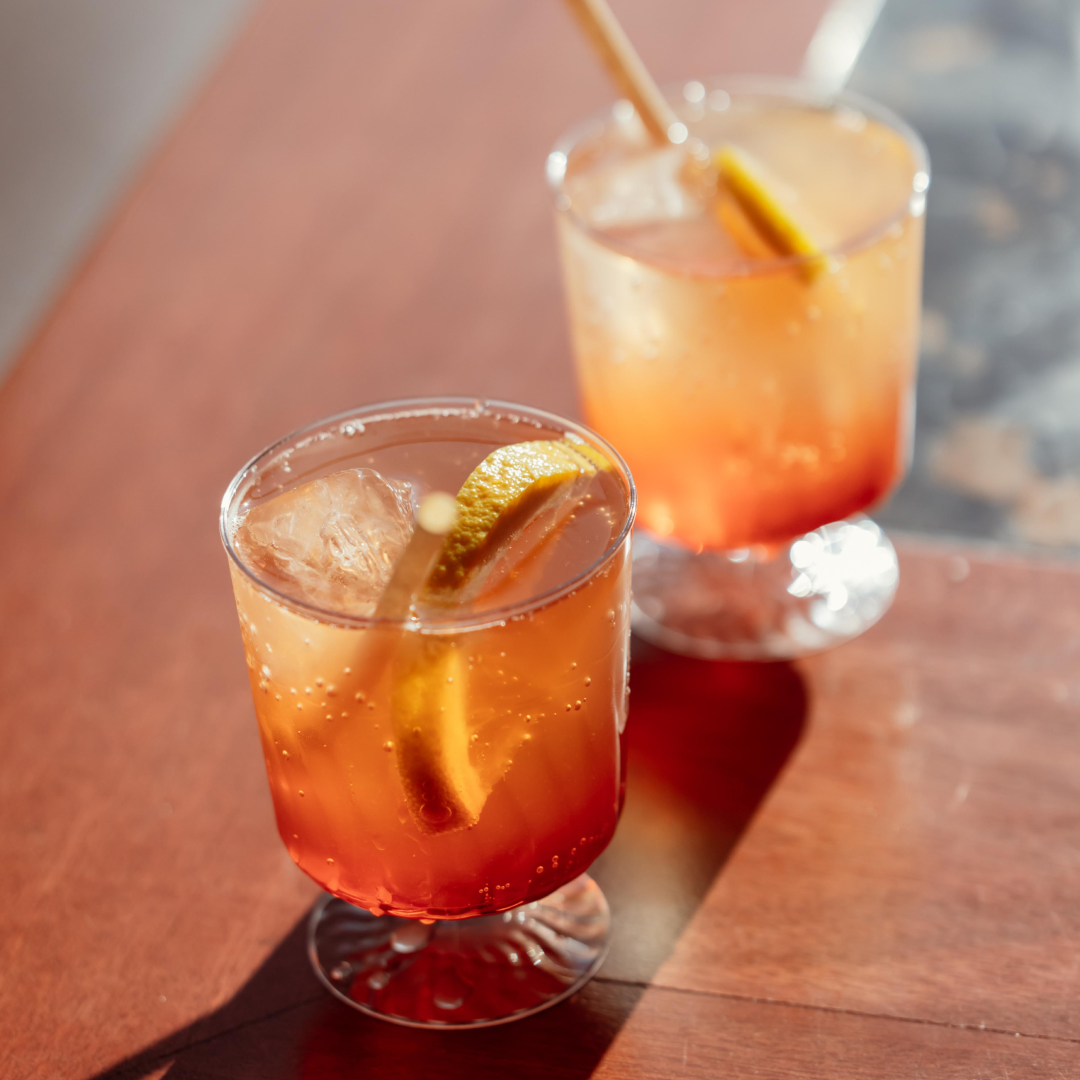 Two cocktails on a table at The Weather Room at Top of the Rock