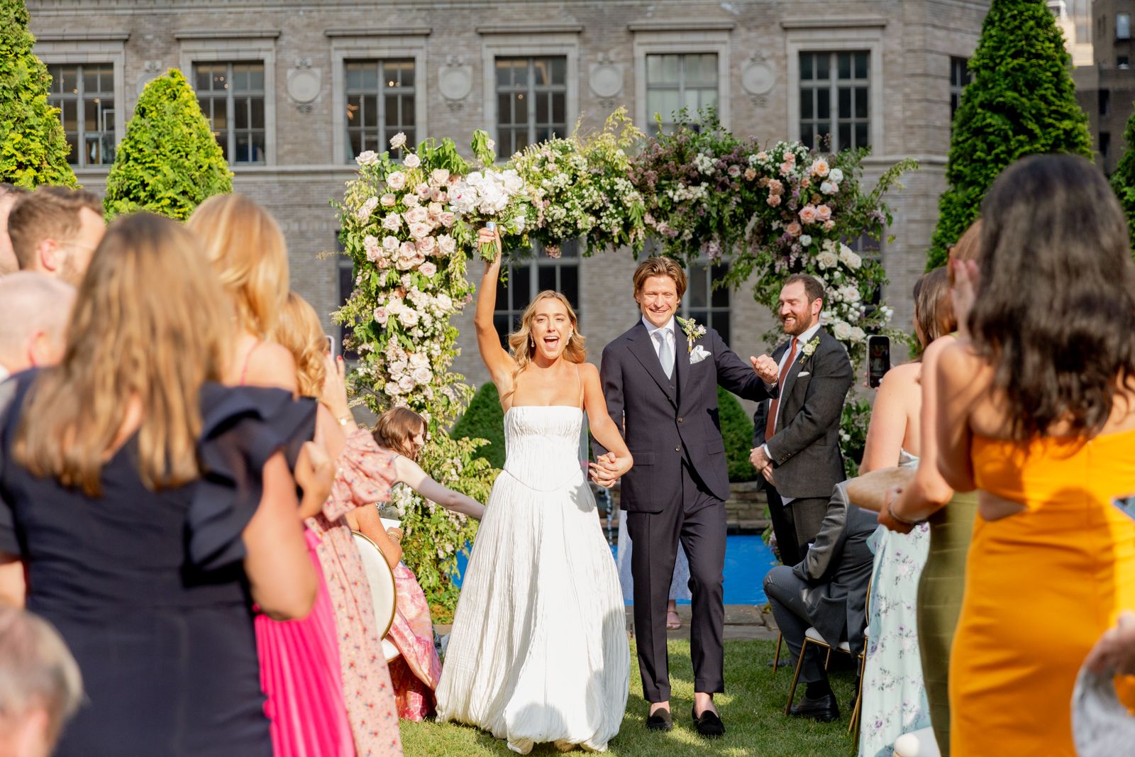 couple walking down aisle at wedding