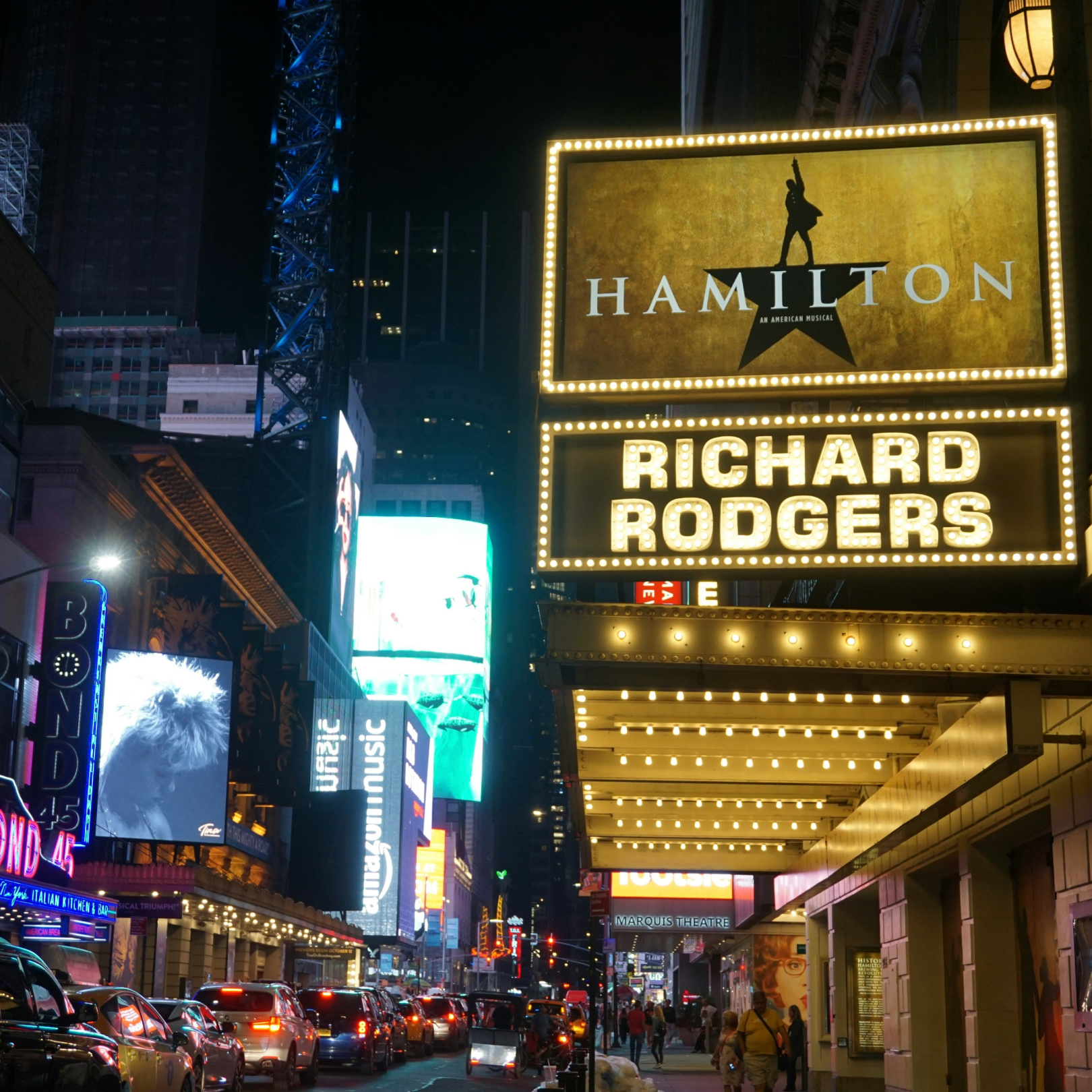 The "Hamilton" on Broadway marquee at night