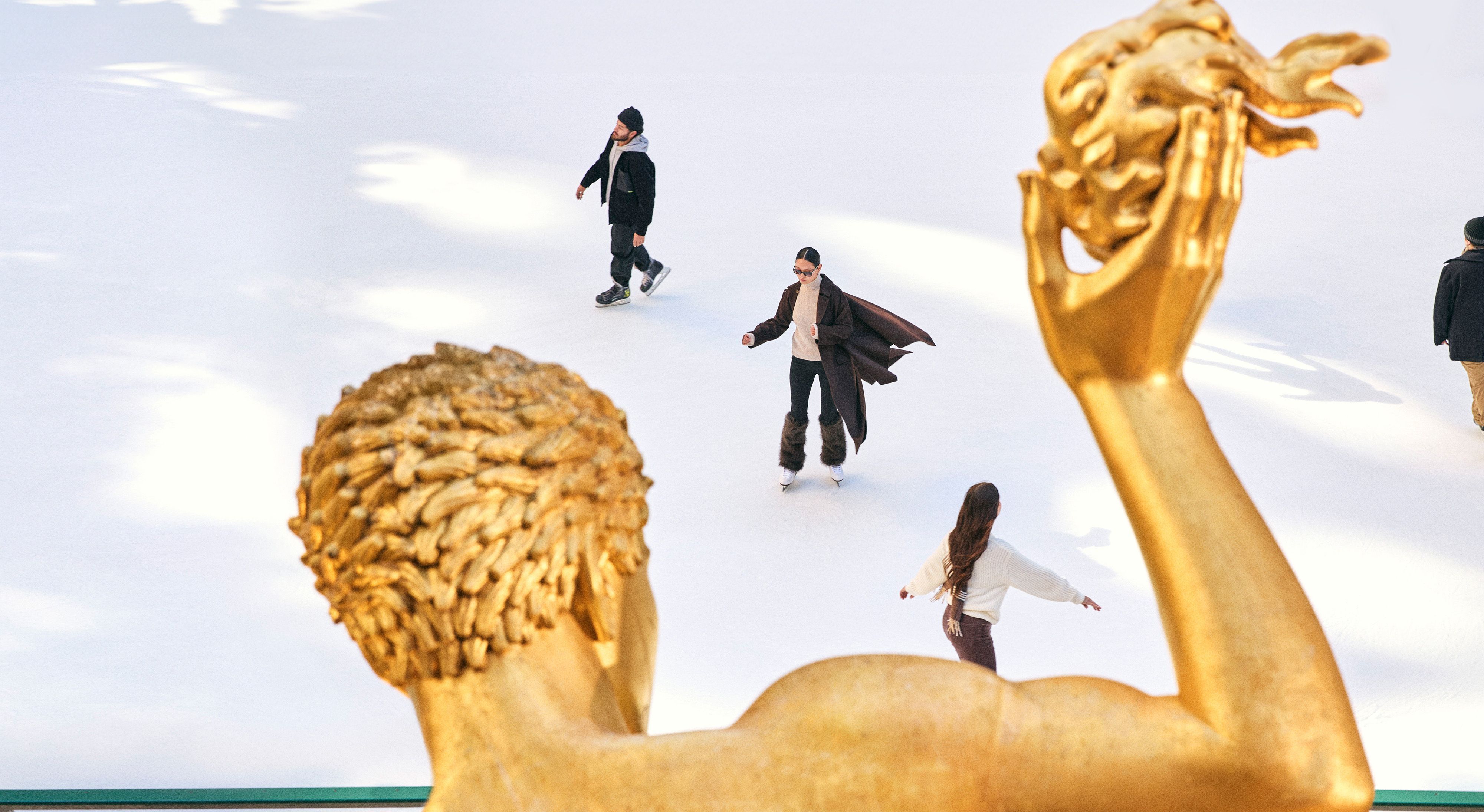 skaters on the rink at rockefeller center