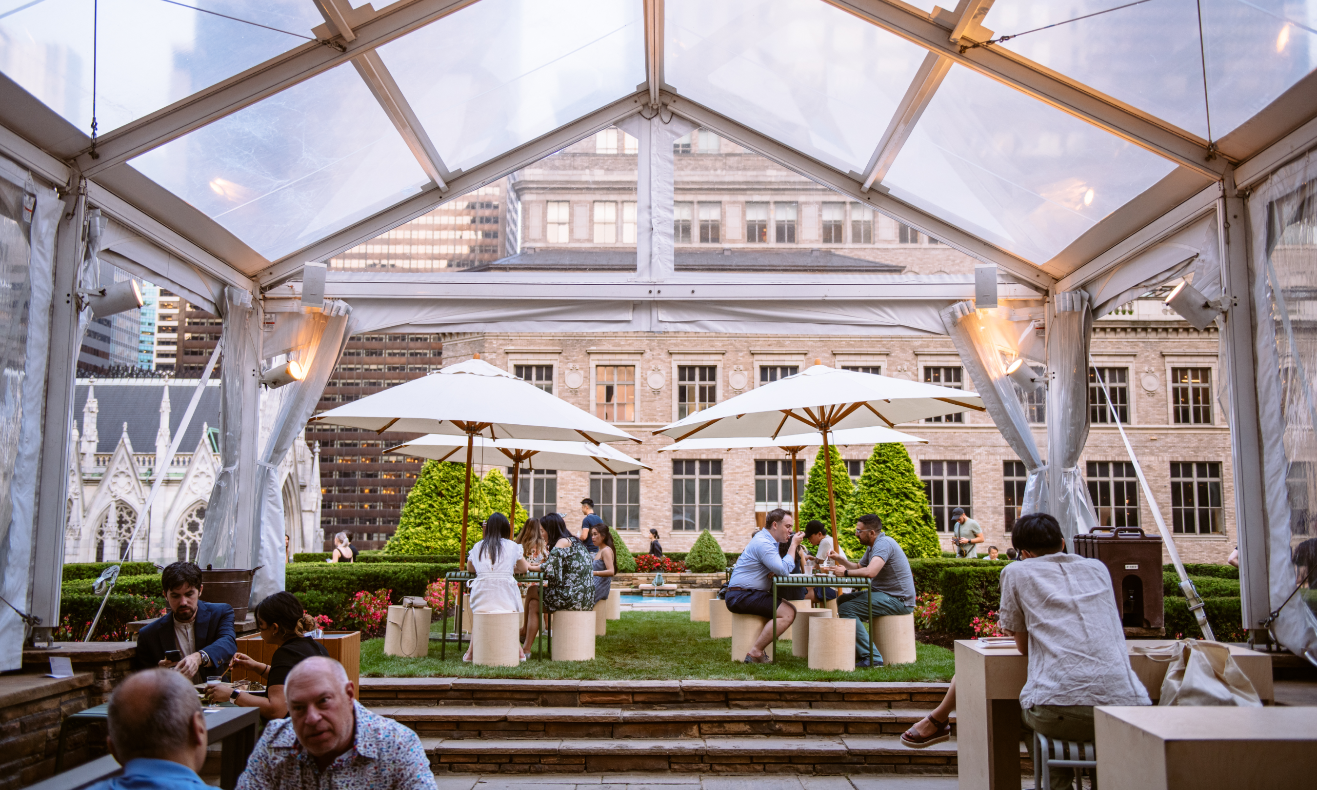 Groups of people sitting at tables at 620 Loft & Garden