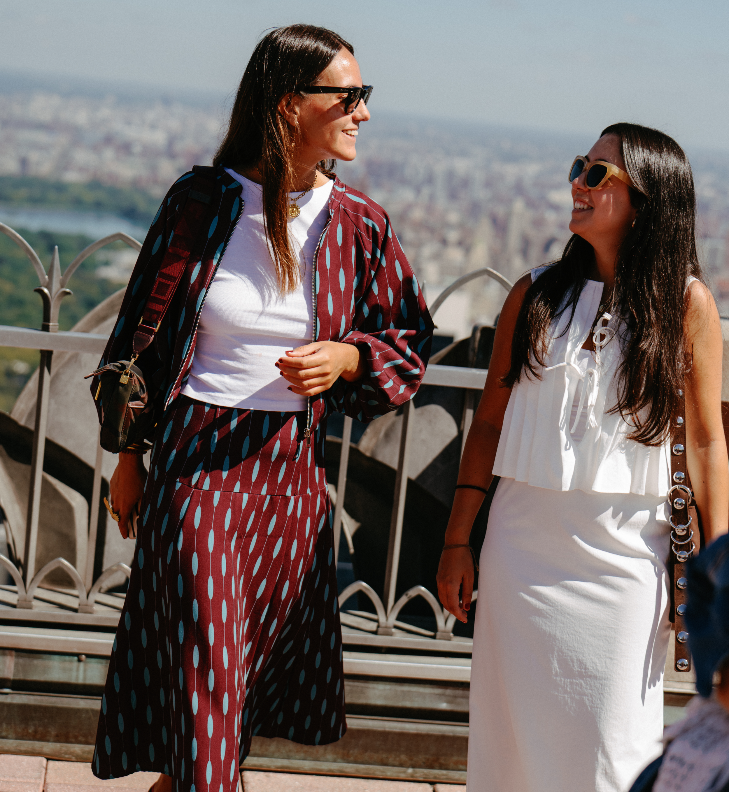 Two women visiting Top of the Rock at Rockefeller Center