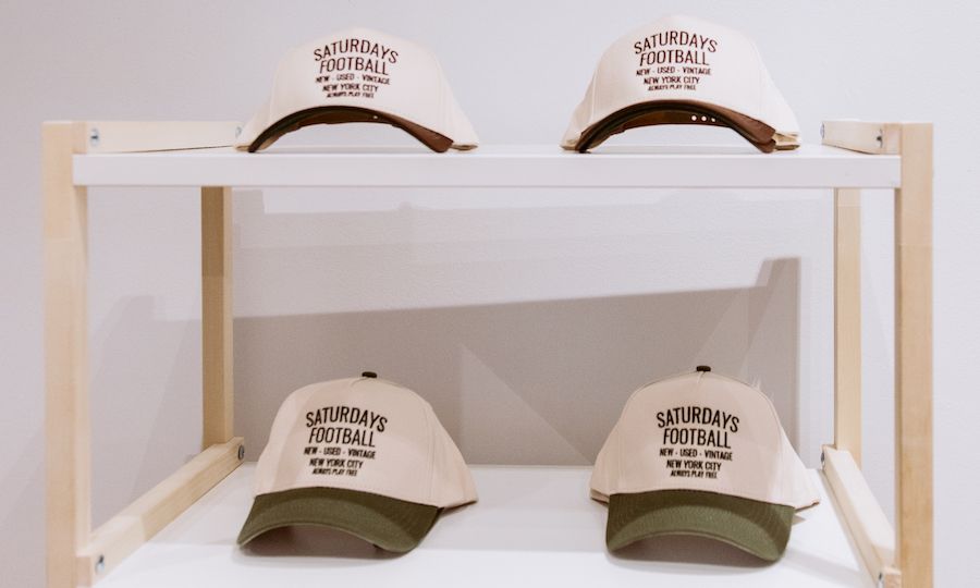 Branded hats on display at Saturdays Football at Rockefeller Center