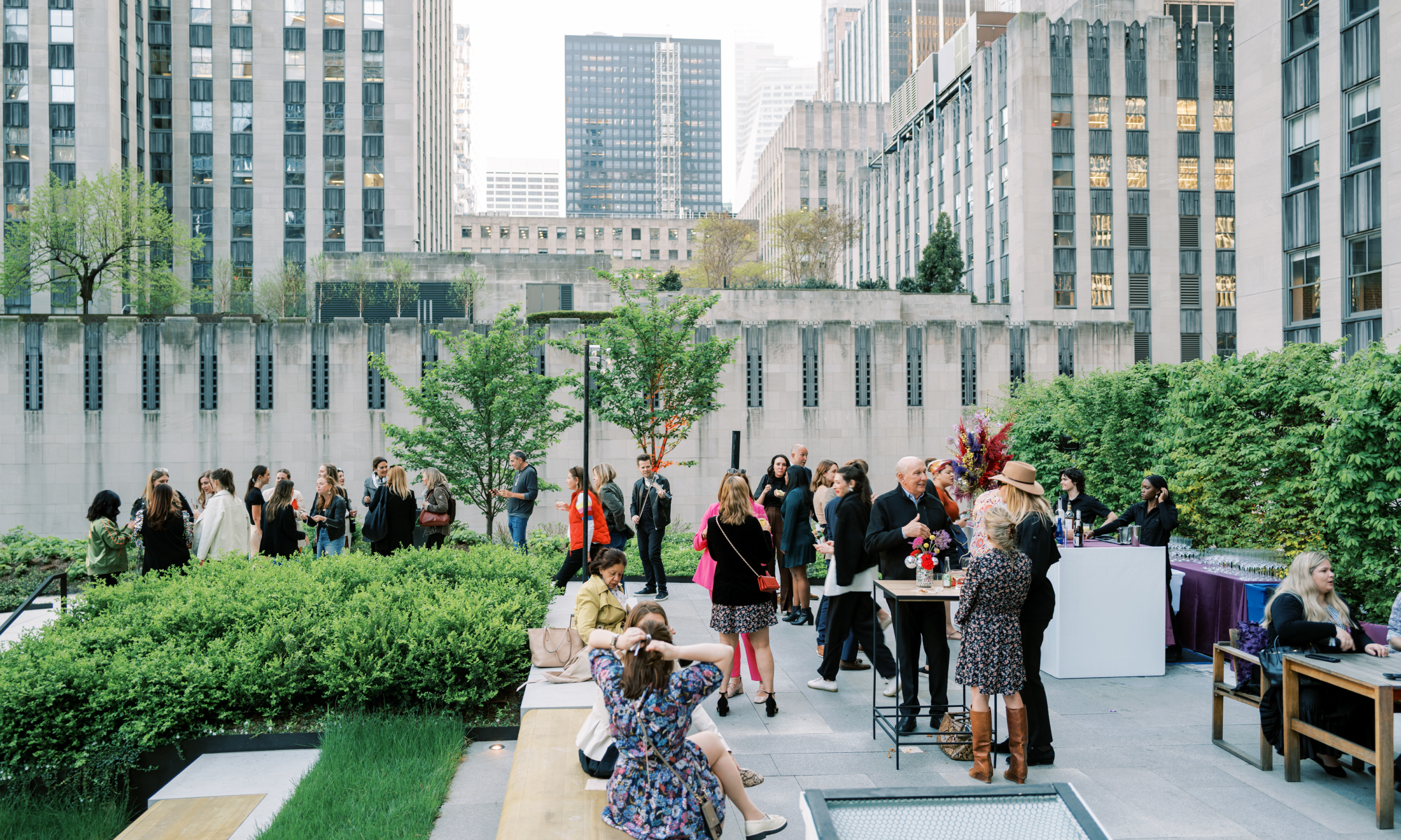 Groups of people gathered on the steps of Radio Park