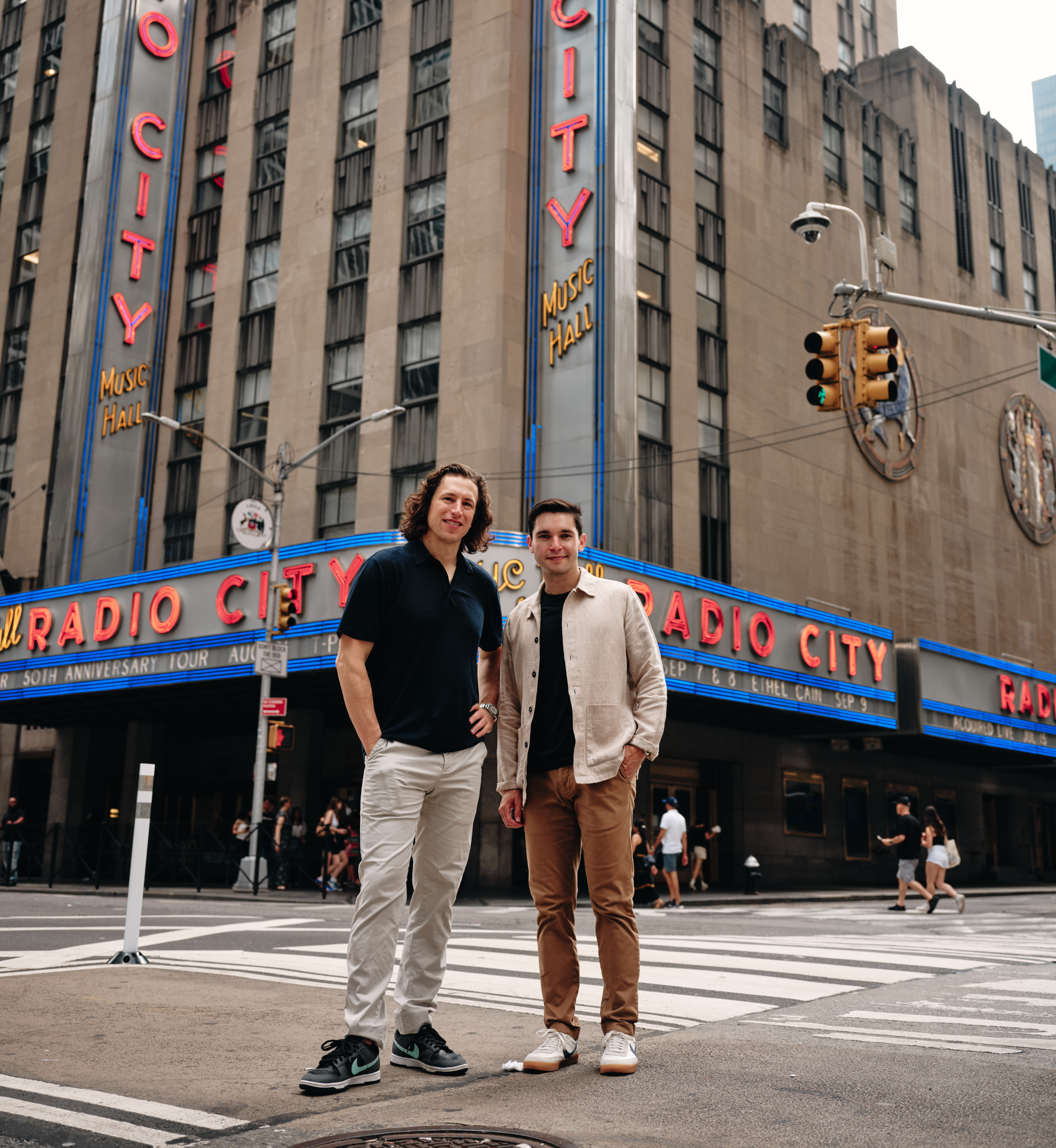 David Rosenthal and Ben Gilbert, co-hosts of 'Acquired' podcast, in front of Radio City Music Hall