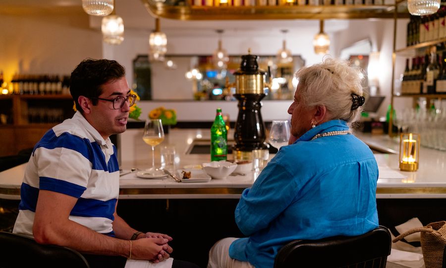 Two people sitting at the bar at The Tipsy Baker at Rockefeller Center