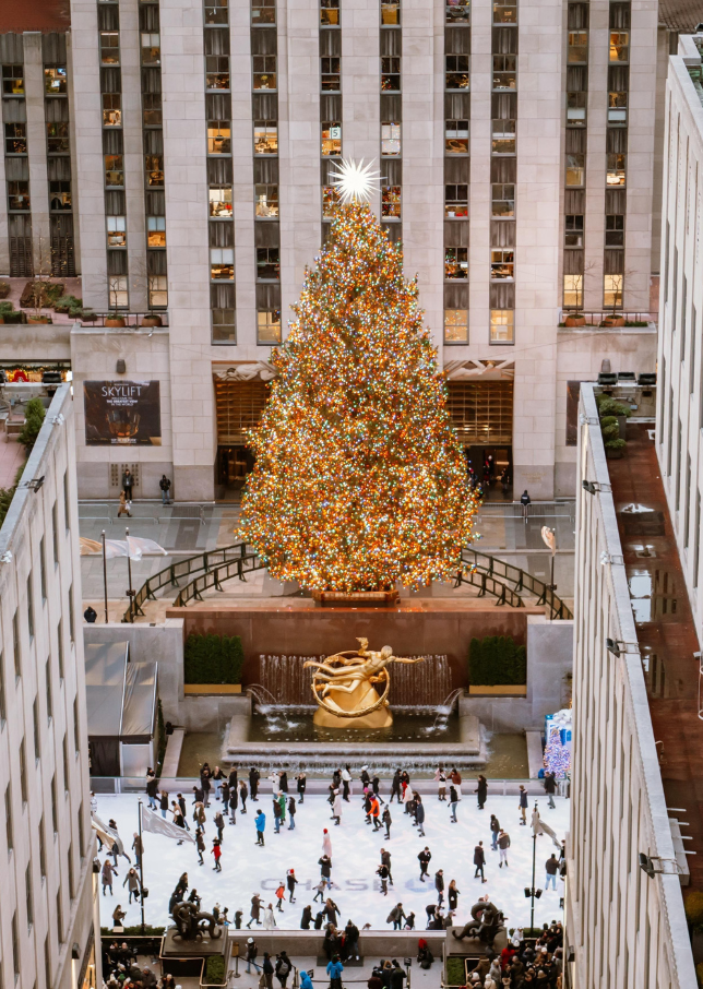 The famous Rockefeller Center Christmas Tree and Prometheus sculpture by The Rink.