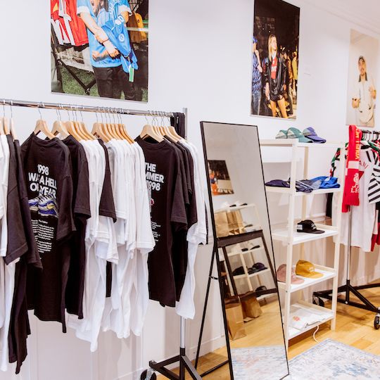 Rack of t-shirts at Saturdays Football at Rockefeller Center