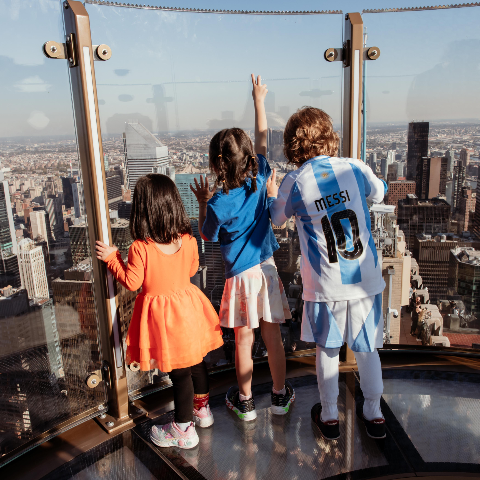 Three kids on SKYLIFT at Top of the Rock
