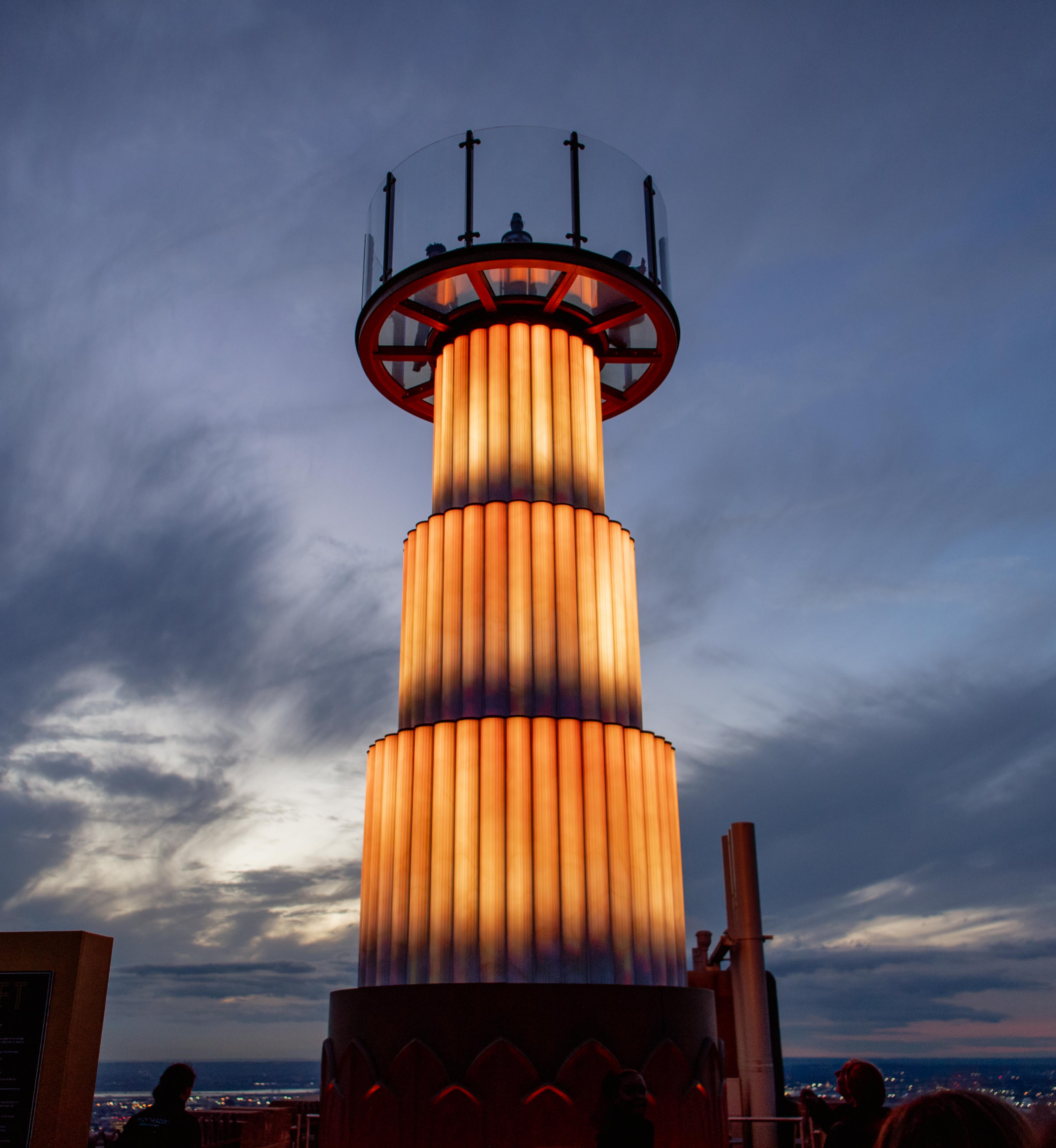 An illuminated Skylift at Top of the Rock at sunset