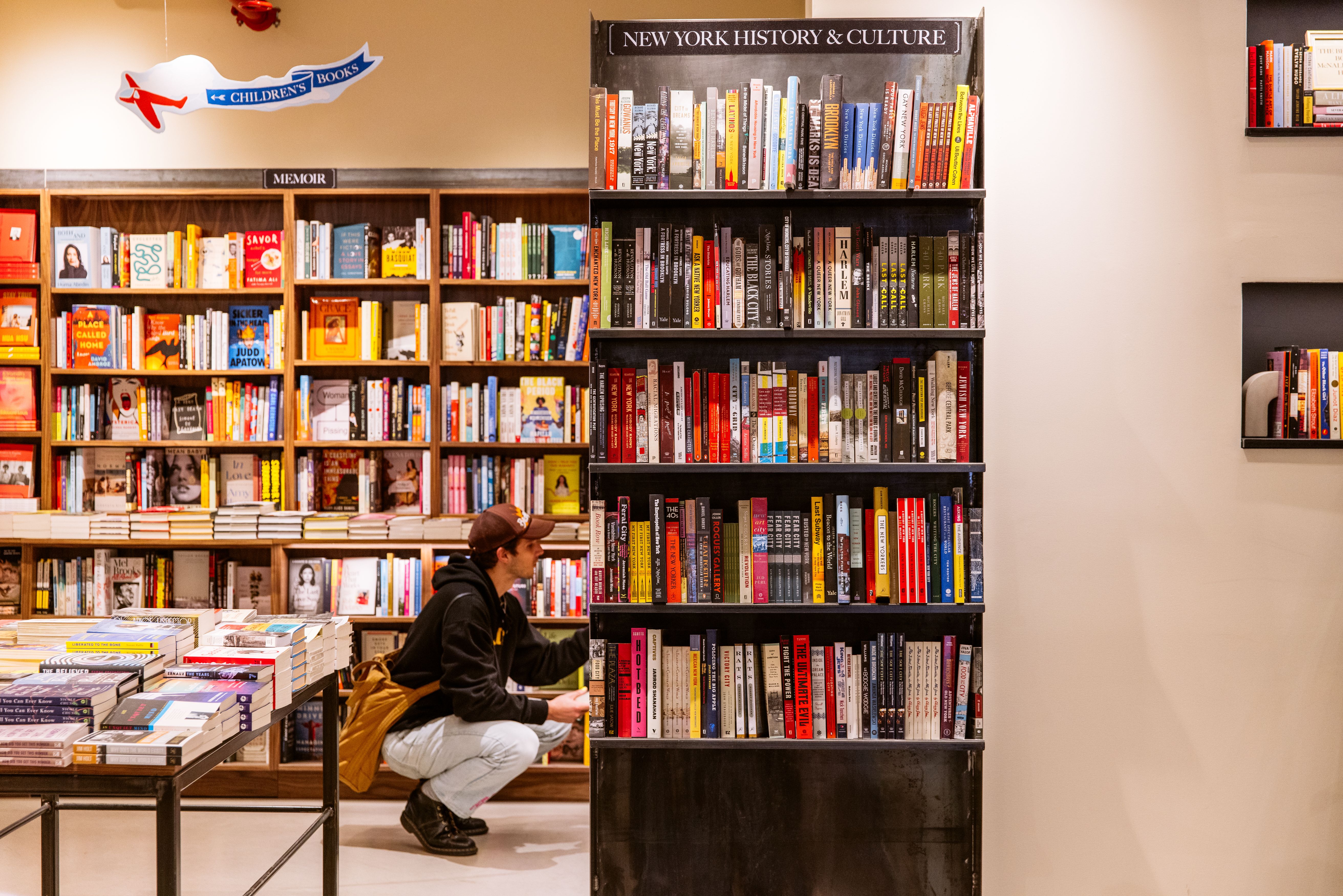 Person browsing books at McNally Jackson