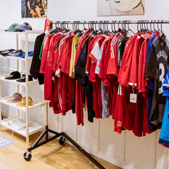 Rack of soccer jerseys at Saturdays Football at Rockefeller Center