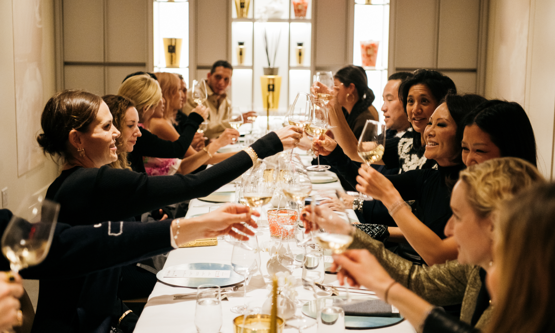 A group of people sitting at a table in NARO's private dining room