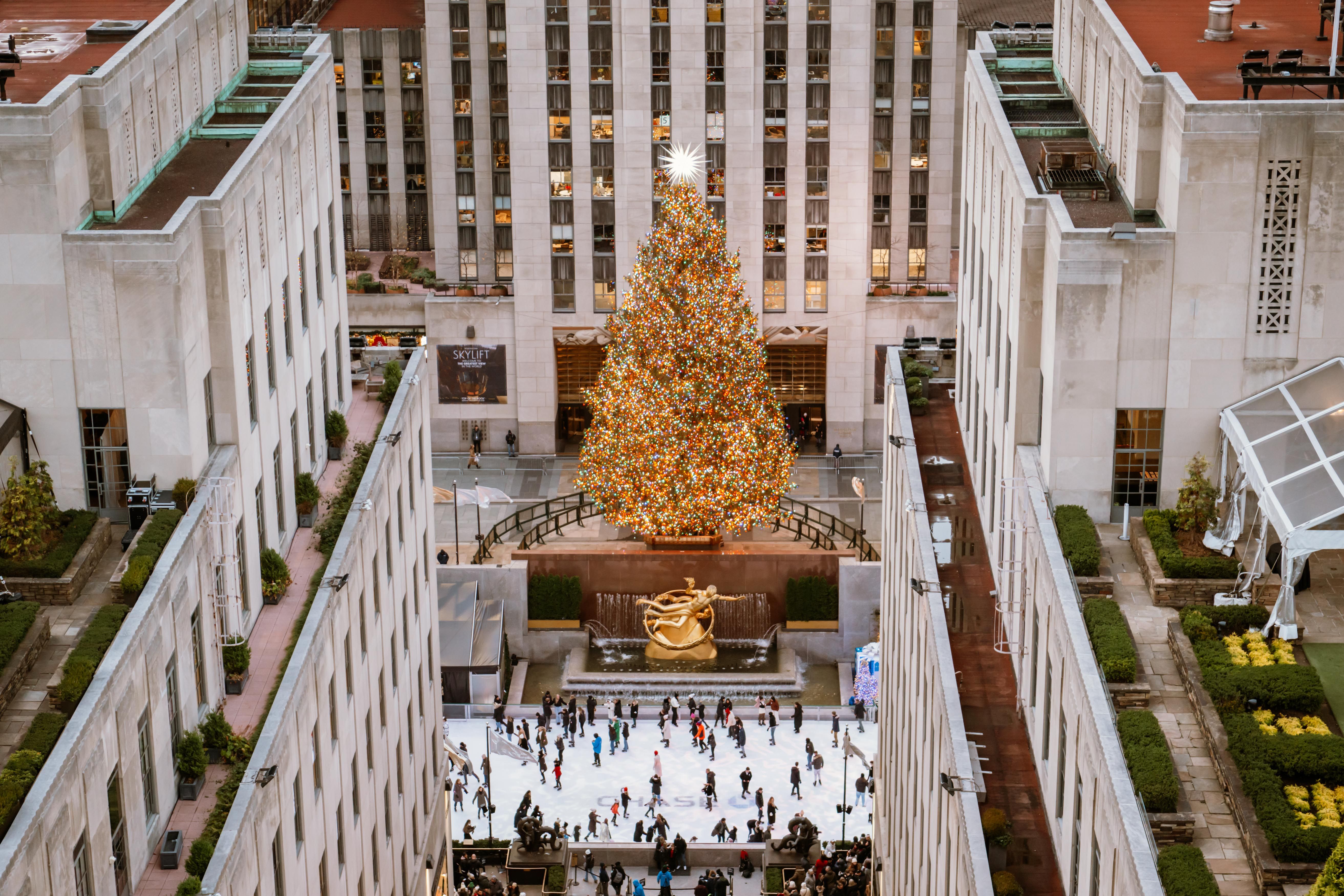 ariel view of the rockefeller center christmas tree and rink