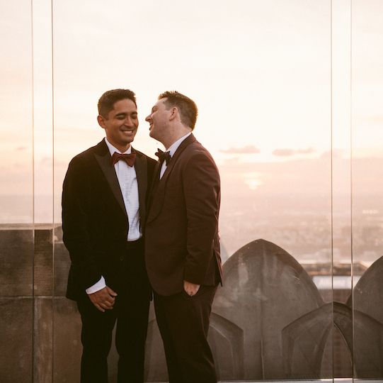 Couple enjoying the sunset view from Top of The Rock