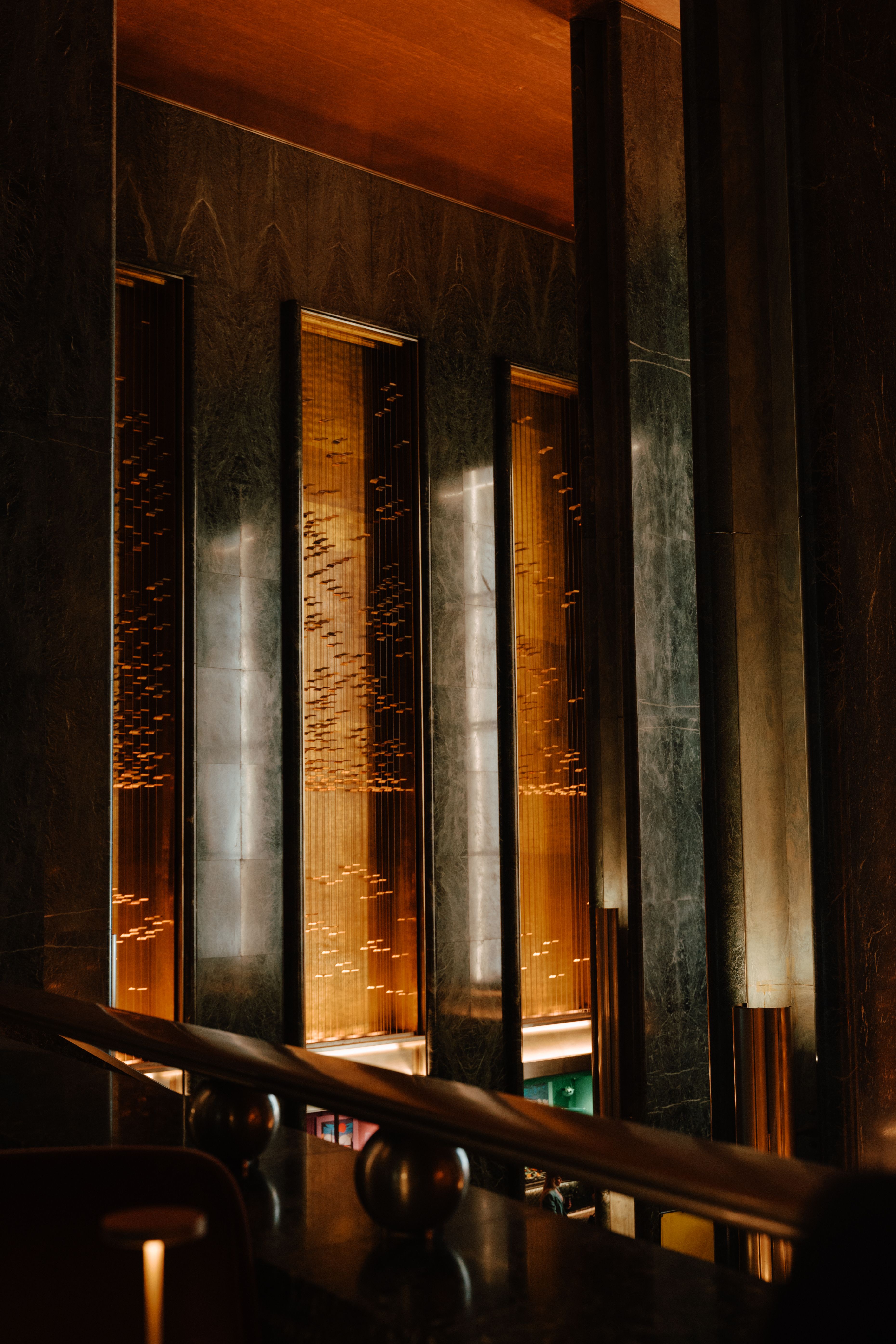 Light and Movement, a sculpture by Michio Ihara, on the main-lobby north and south walls of 630 Fifth Avenue.