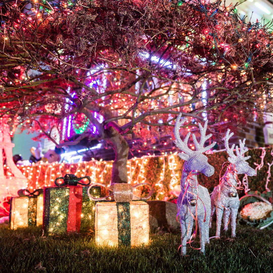 A home lit up with Christmas lights and decorations in Brooklyn's Dyker Heights neighborhood