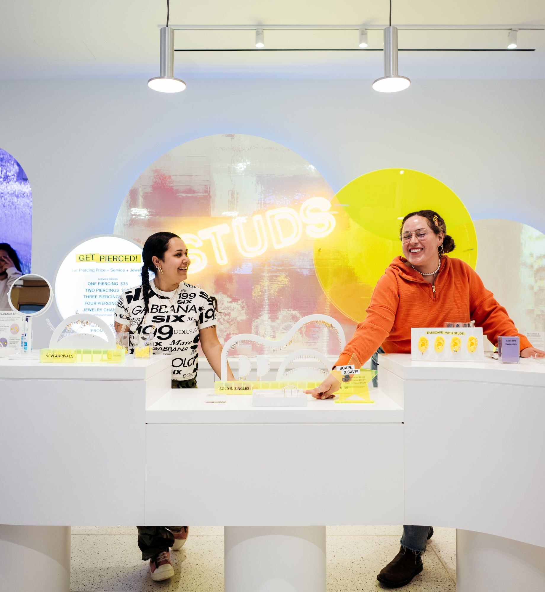 Two employees inside Studs' new studio at Rockefeller Center