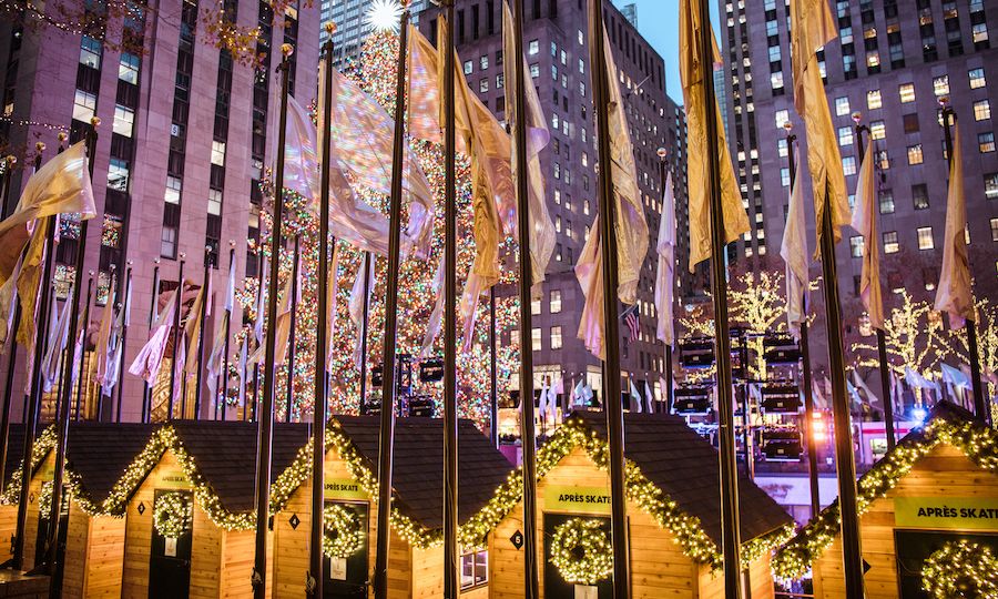 Row of Après Skate Chalets with illuminated lights