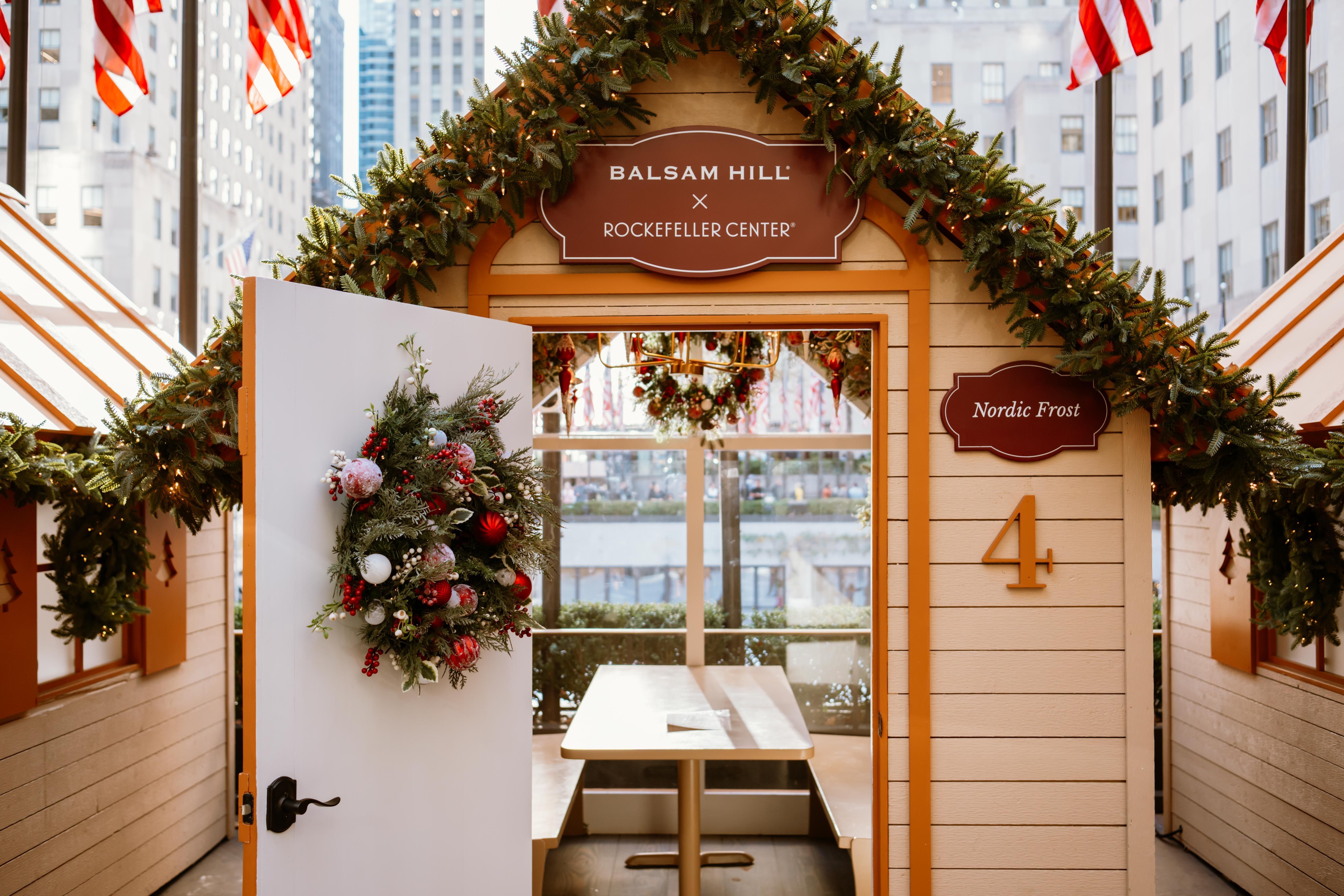 Rink-side chalet cabins decorated for the holidays