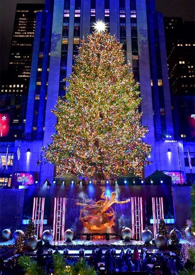 The famous Rockefeller Center Christmas Tree and Prometheus sculpture by The Rink.
