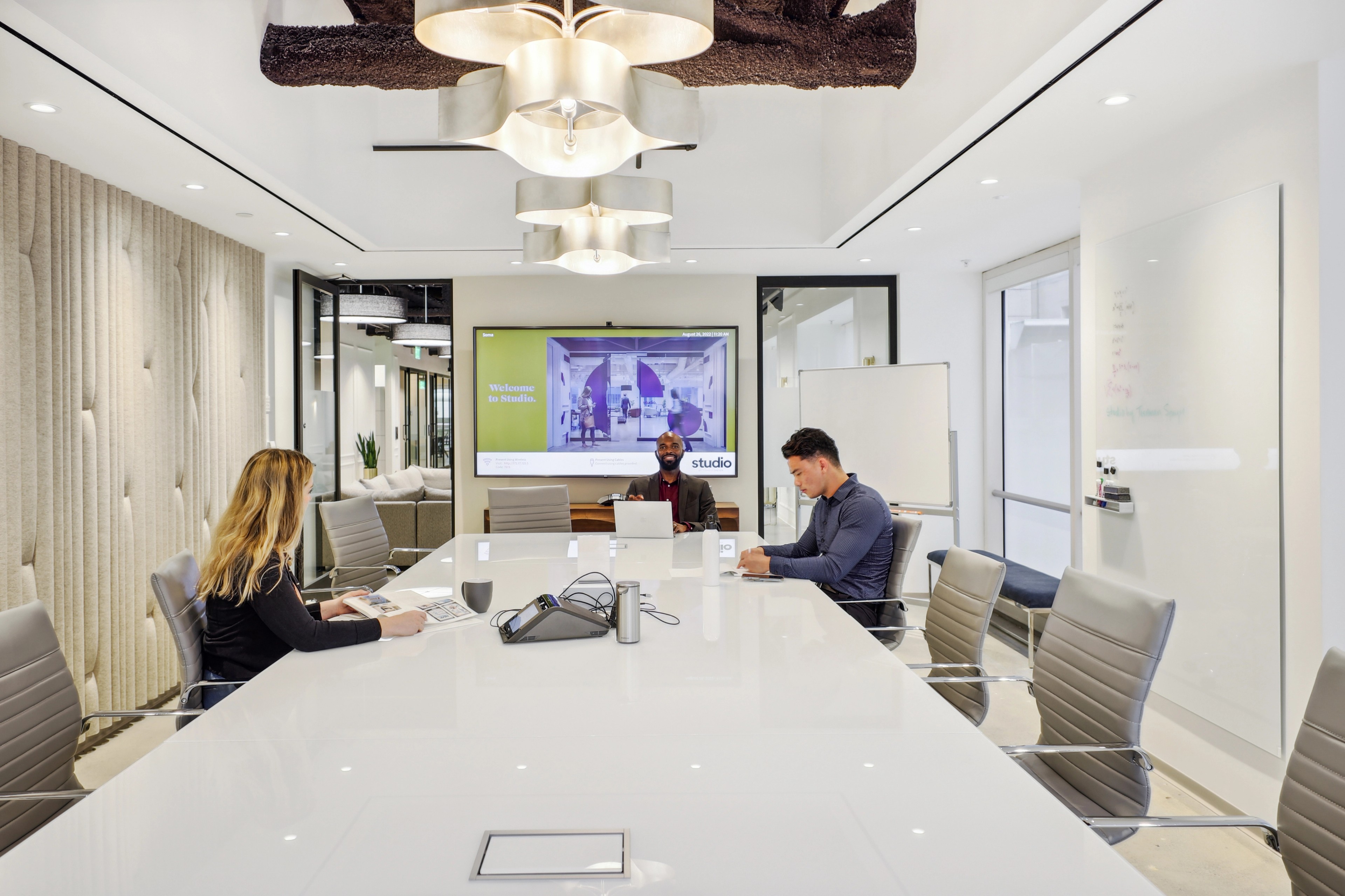 Interior view of 333 Bush with people at a conference table