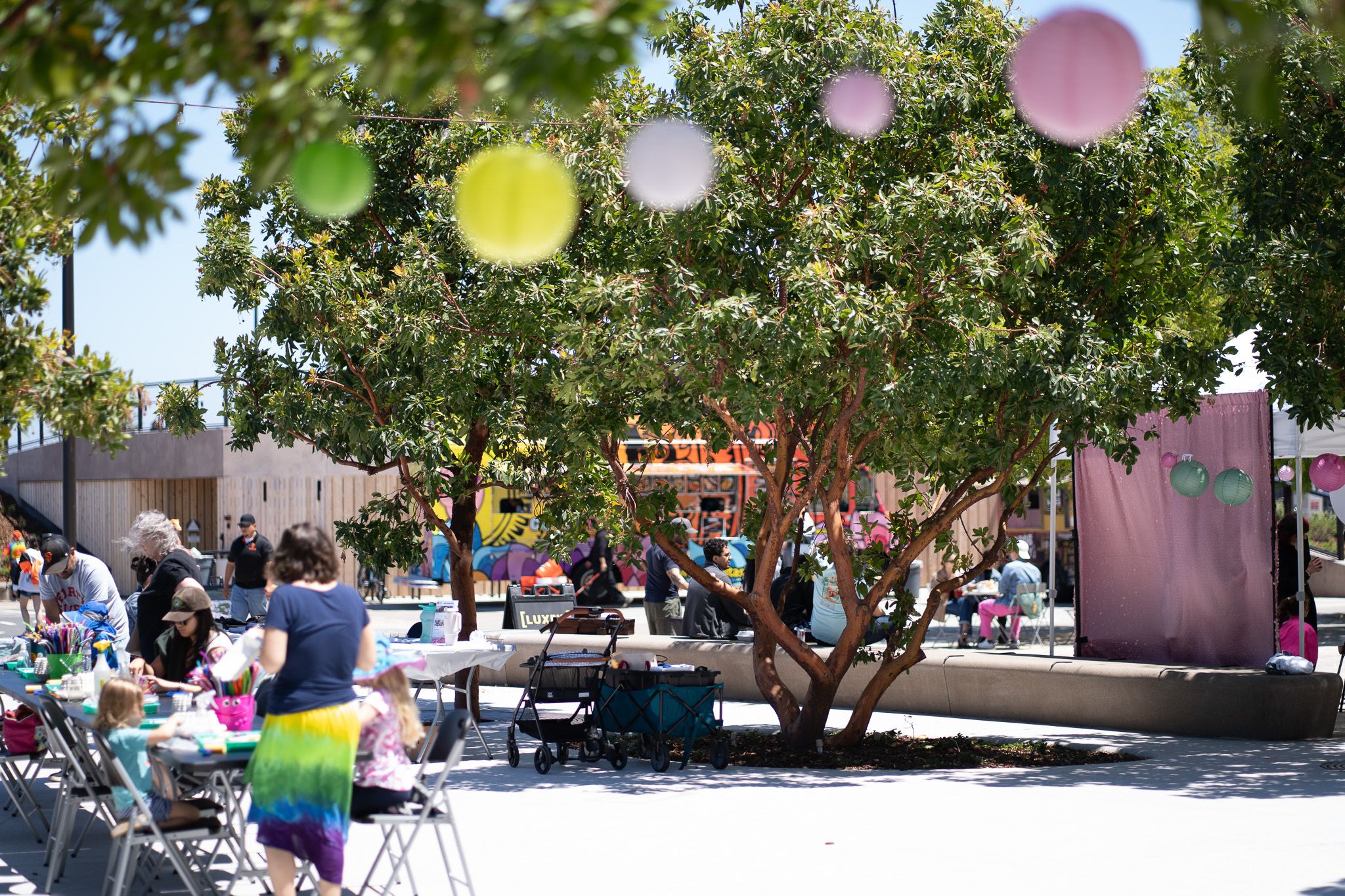 Fitness classes, events, art, seasonal programming, and game-day activations keep the rhythm going.