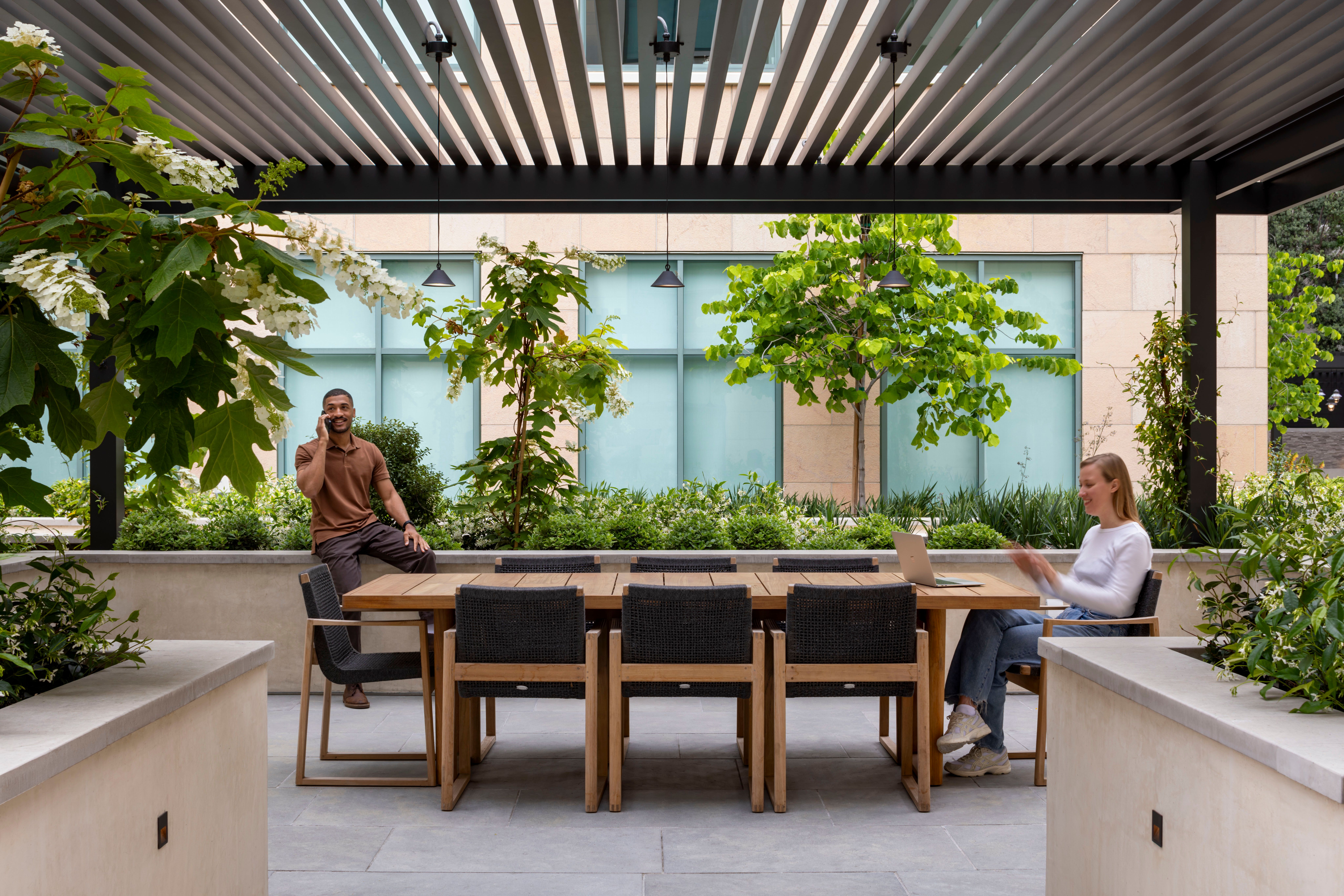 Host an outdoor conference meeting with colleagues.