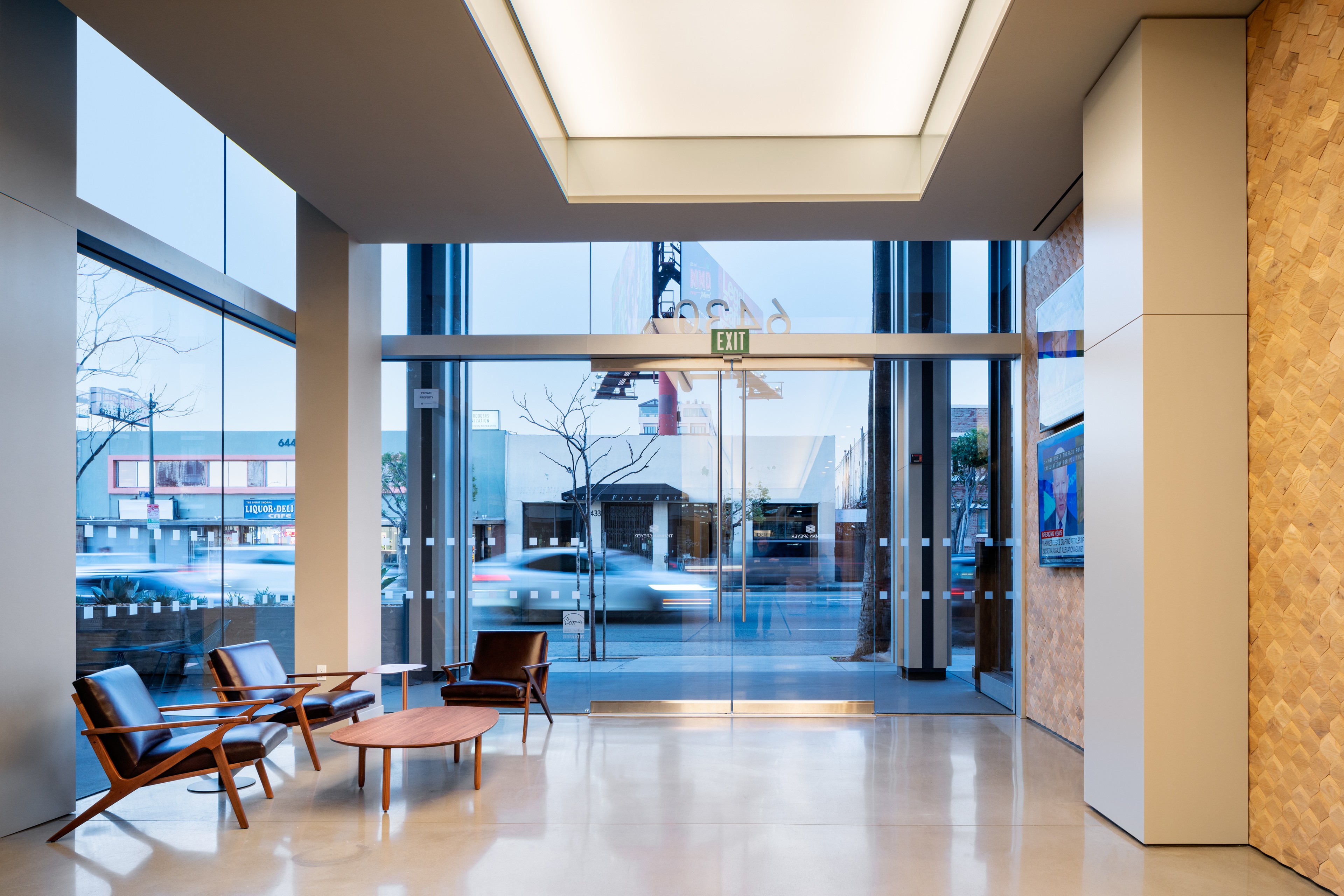 Interior view 6430 Sunset lobby with wall of windows