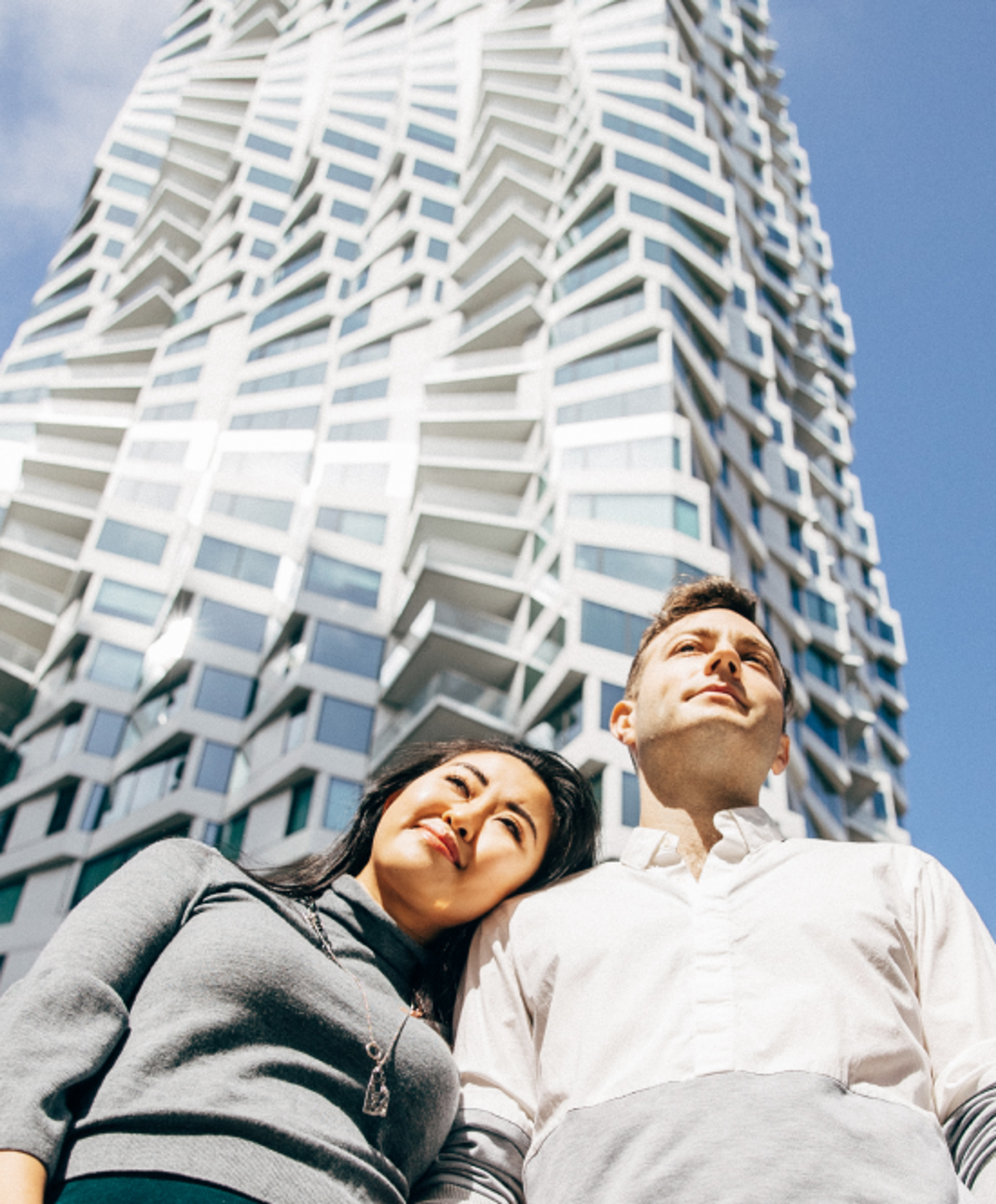 Couple standing outside the MIRA building in San Francisco
