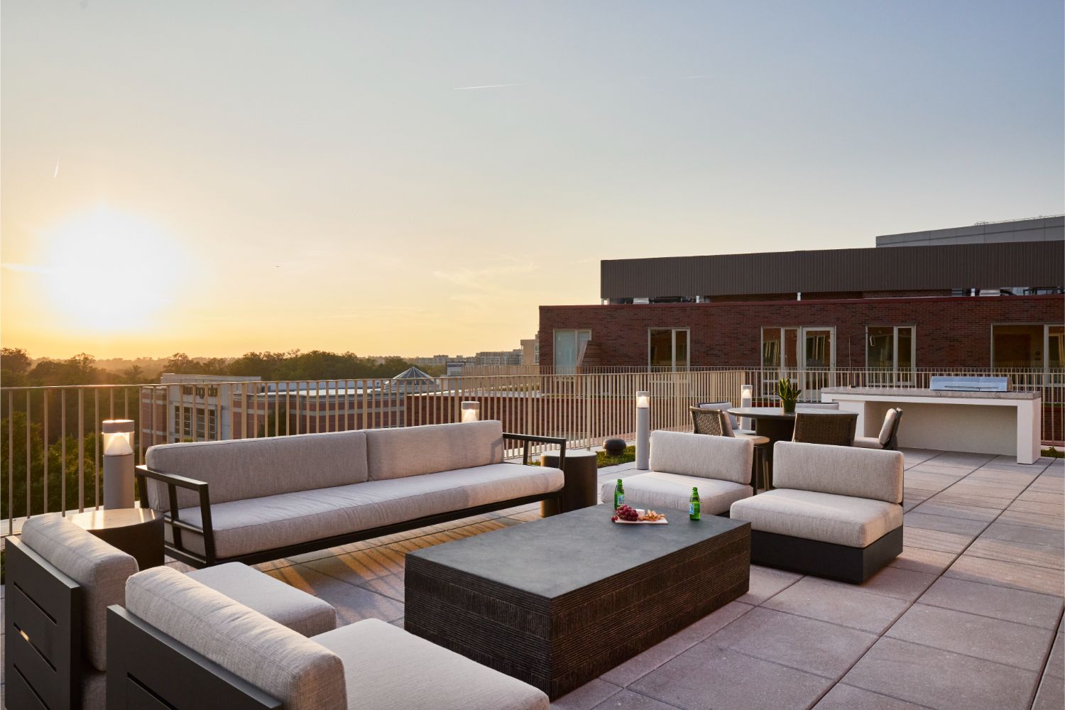 Rendering of friends enjoying time on the outdoor terrace at Residences at Mazza