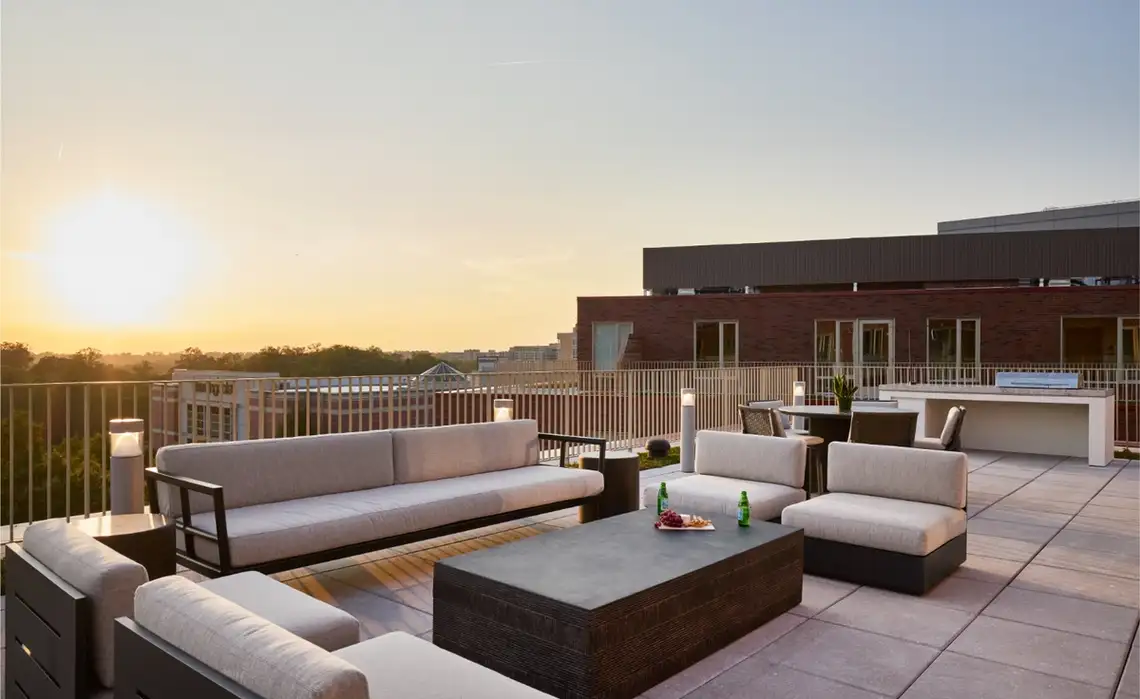 Rendering of friends enjoying time on the outdoor terrace at Residences at Mazza