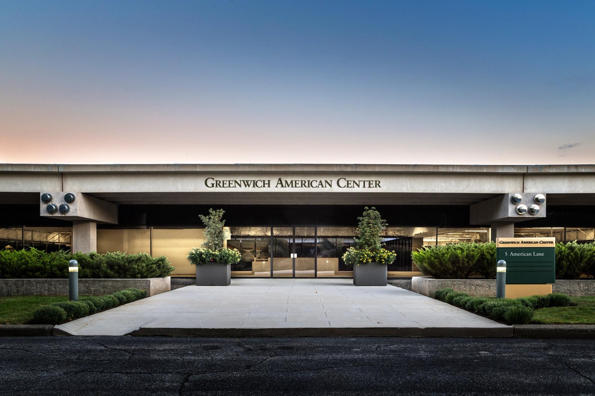 the entrance to the Greenwich American Center, a large office complex located in Greenwich, Connecticut. 