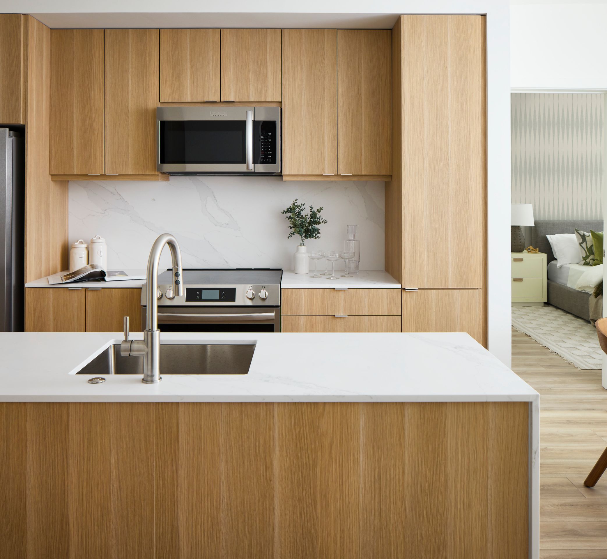 rendering of an open floor plan with kitchen and living room at mazza