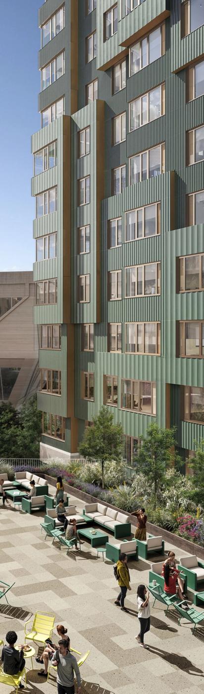 The exterior of Verra Apartments in Boston, MA, featuring a modern facade, outdoor lounges, and large windows.